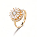 Gold rotatable four-petal clover ring with sparkling zircon stones — adjustable spinner anxiety ring